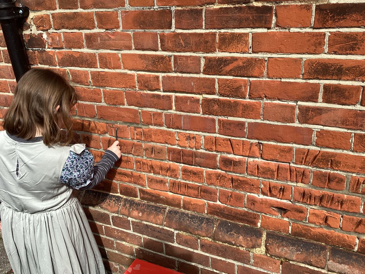 InfantSandwich's tweet photo. In Victorian times children had to sharpen their slate sticks on the wall. These marks can still be seen today. #VictorianLife https://t.co/KeRe5LoUfR