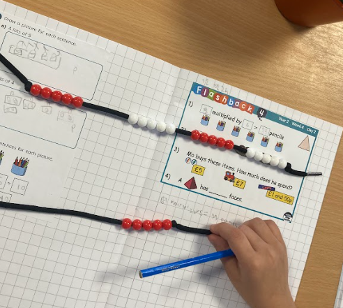 Van Gogh class learning about multiplication. They have explored using arrays to help them make link with division also. The children are also using bead strings to help them count in 2s, 5s ad 10s.