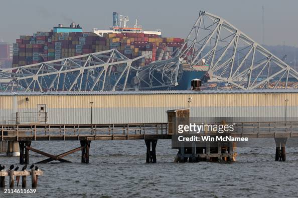 A #cargo ship is shown after running into and collapsing the Francis Scott Key #Bridge in #Baltimore, #Maryland. Rescuers are searching for at least seven people, authorities say, while two others have been pulled from the #Patapsco River. 📸: @robertleecarr + @winmc