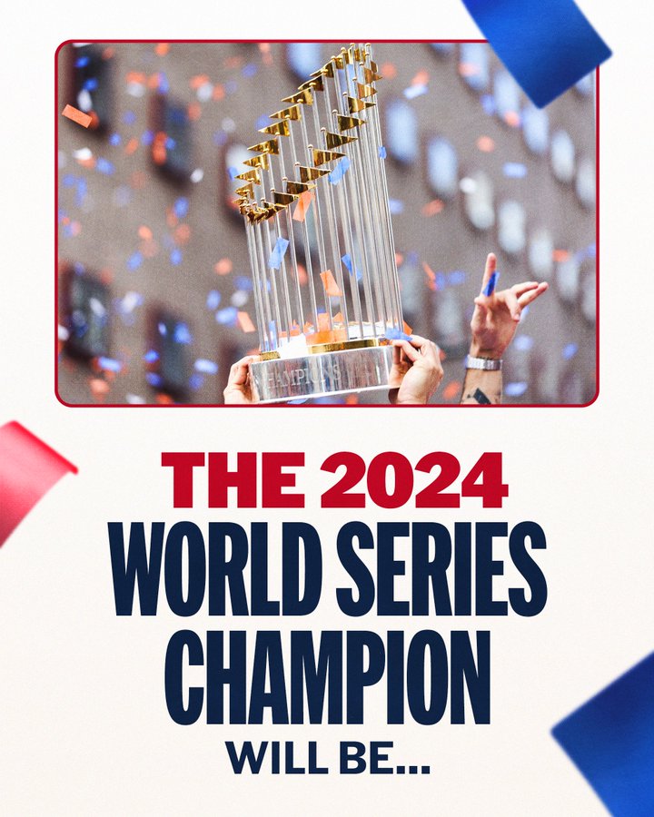 The 2024 World Series Champion will be …
Pictured: The Commissioner's Trophy is held in the air. It is surrounded by falling confetti.
