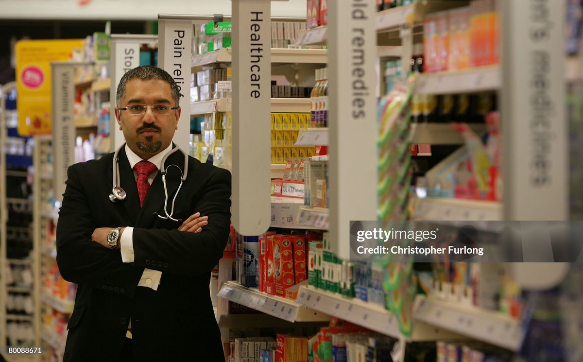 Doctor Mohammed Jiva poses as he prepares to see patients in England's first GP surgery inside a Sainsbury's supermarket in Manchester, England. The surgery which will be run from inside Heaton Park branch of Sainsburys will be run on a six month pilot scheme (2008)