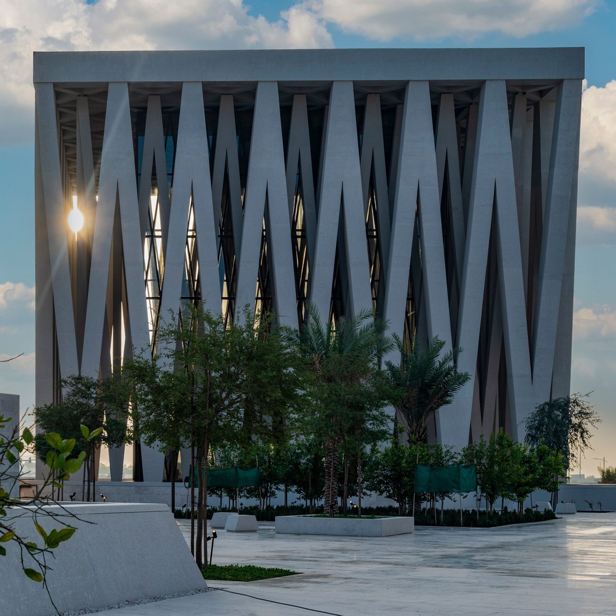 1 year of the Abrahamic Family House. The mosque's façade is formed of seven arches on each side. The church façade is a density of columns symbolizing rays of light. The synagogue’s V-shaped columns reference the overlapping palm fronds on the traditional Jewish prayer shelter.