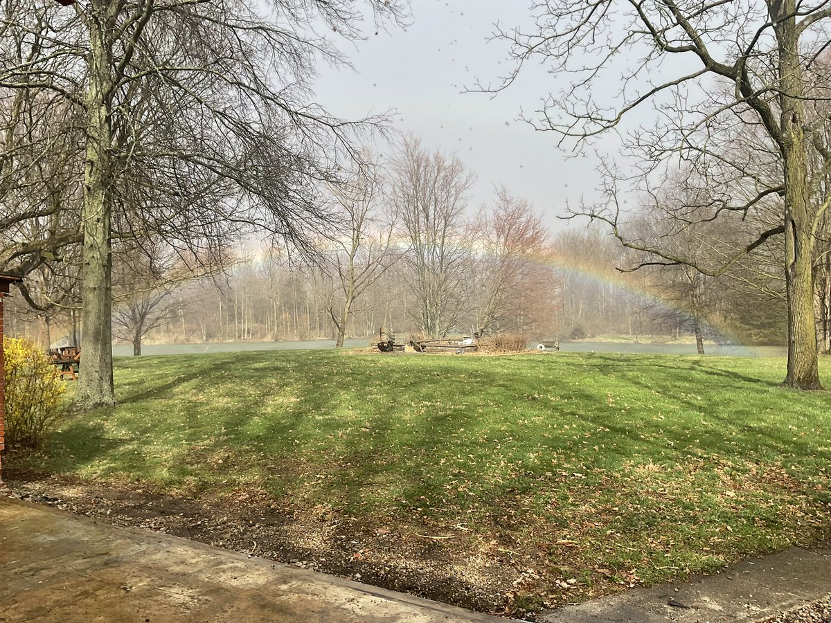 Rainbow centered over the pond, I am headed to the garage to grab a shovel #OliverAcres