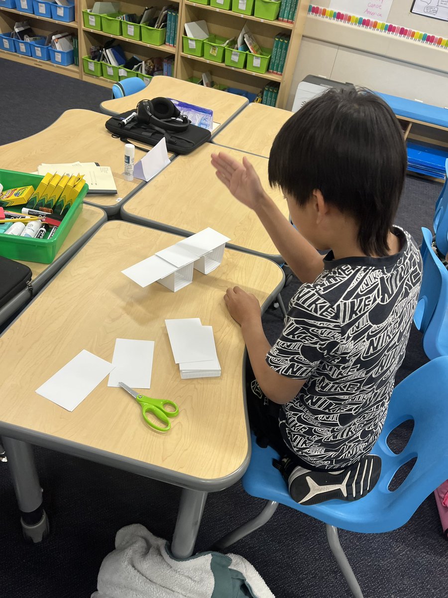 tatisilva1007's tweet image. These 3rd graders had to TRY to build a bridge out of index cards… no tape or glue! They came up with some great designs! #SpringLearning