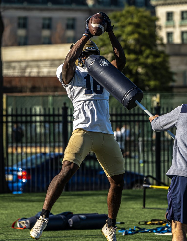 Chin straps buckled on our 1st day of FULL PADS. #GoNavy | #LetsFly25