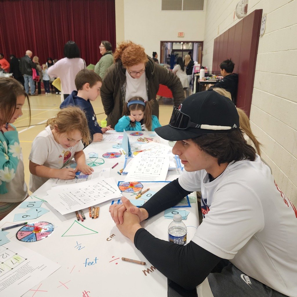 Last week, Overlook students and their families played games and completed creative math activities at Overlook's Math Night. Members of the ASHS Varsity and Junior Varsity Baseball teams volunteered their time to help students sharpen their math skills! #ASDProud