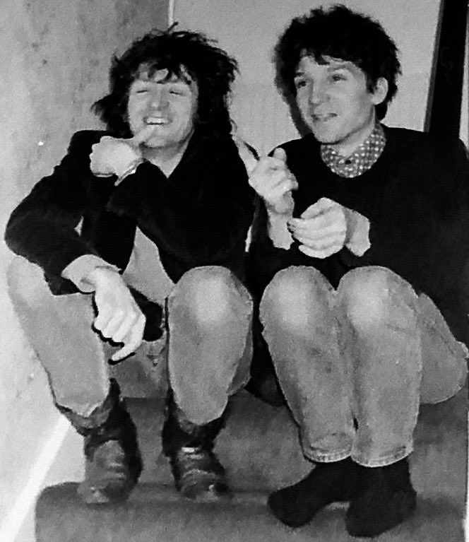 Epic Soundtracks’ birthday last Saturday, anniversary of Nikki Sudden’s death today. 
Here they both are, in happier times, perched on my staircase in Coventry back in the 1990’s.
#SwellMaps