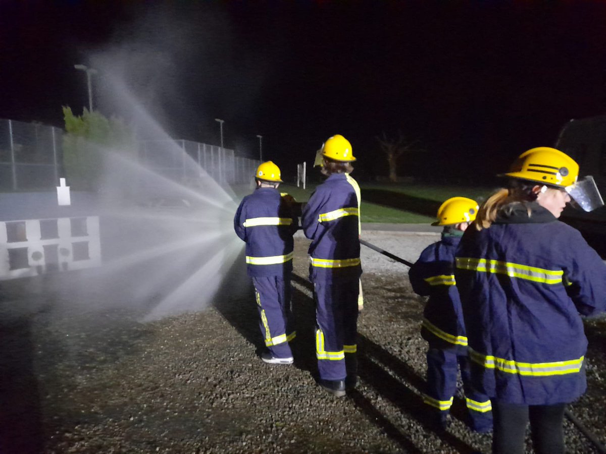 The crew from Coniston Fire Station were called to assist the youth club at Coniston Sports and social centre, to help extinguish a 'small house fire'. The crew showed the junior Fire Fighters how to pump from open water using a Light portable pump, how to improvise a dam and