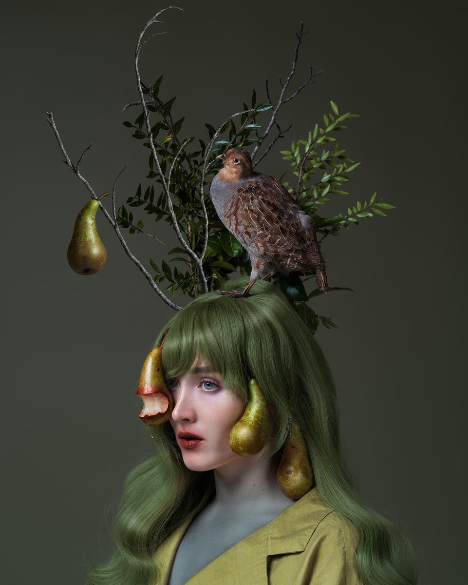 An emotional narrative created by @claireluxtonart: 'MY TRUE LOVE GAVE TO ME⁣' (2023⁣) - ⁣ See our FB or IG post for her accompanying poem! #beautifulbizarre #claireluxtonart #claireluxton #contemporaryartist #narrativephotography #femalephotographer #peartree #mixedmediaart