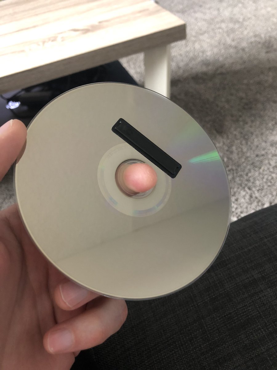 robwikstrom's tweet photo. Opened my new Curious Case of Benjamin Button criterion collection BluRay and discovered after trying to play it that the security strip was stuck to the back of the disc. 

@Criterion any tips on how I should safely remove the glue so I can watch it? https://t.co/22bTkXeO9y