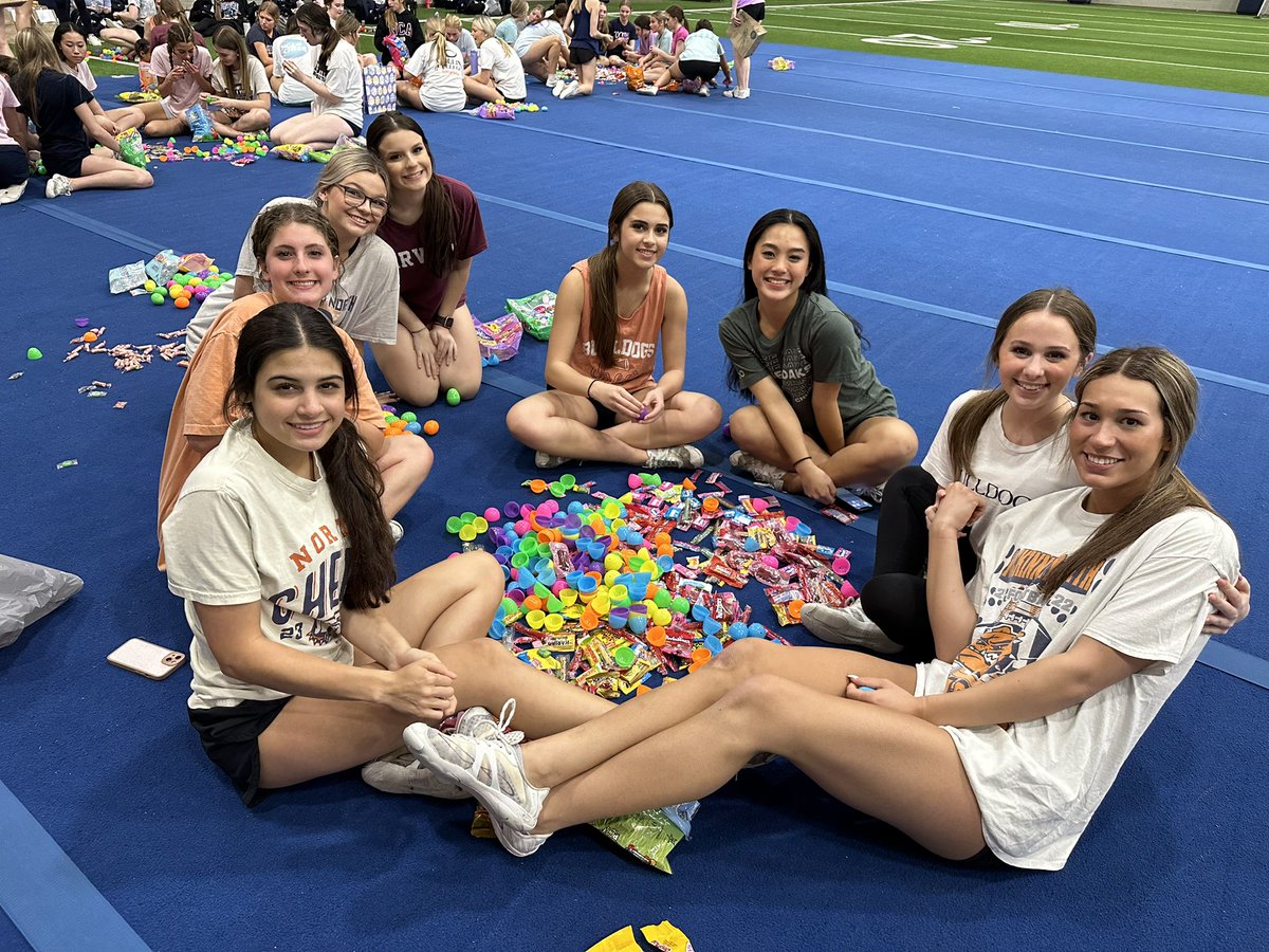 cheer_MNHS's tweet photo. Our Egg My Yard Fundraiser in action. Our team stuffed and organized 2,000 eggs in less than 30 minutes! So proud of our teamwork! 💙📣🧡 #WeAreNorth #EggMyYard https://t.co/nNsgq7E5pt