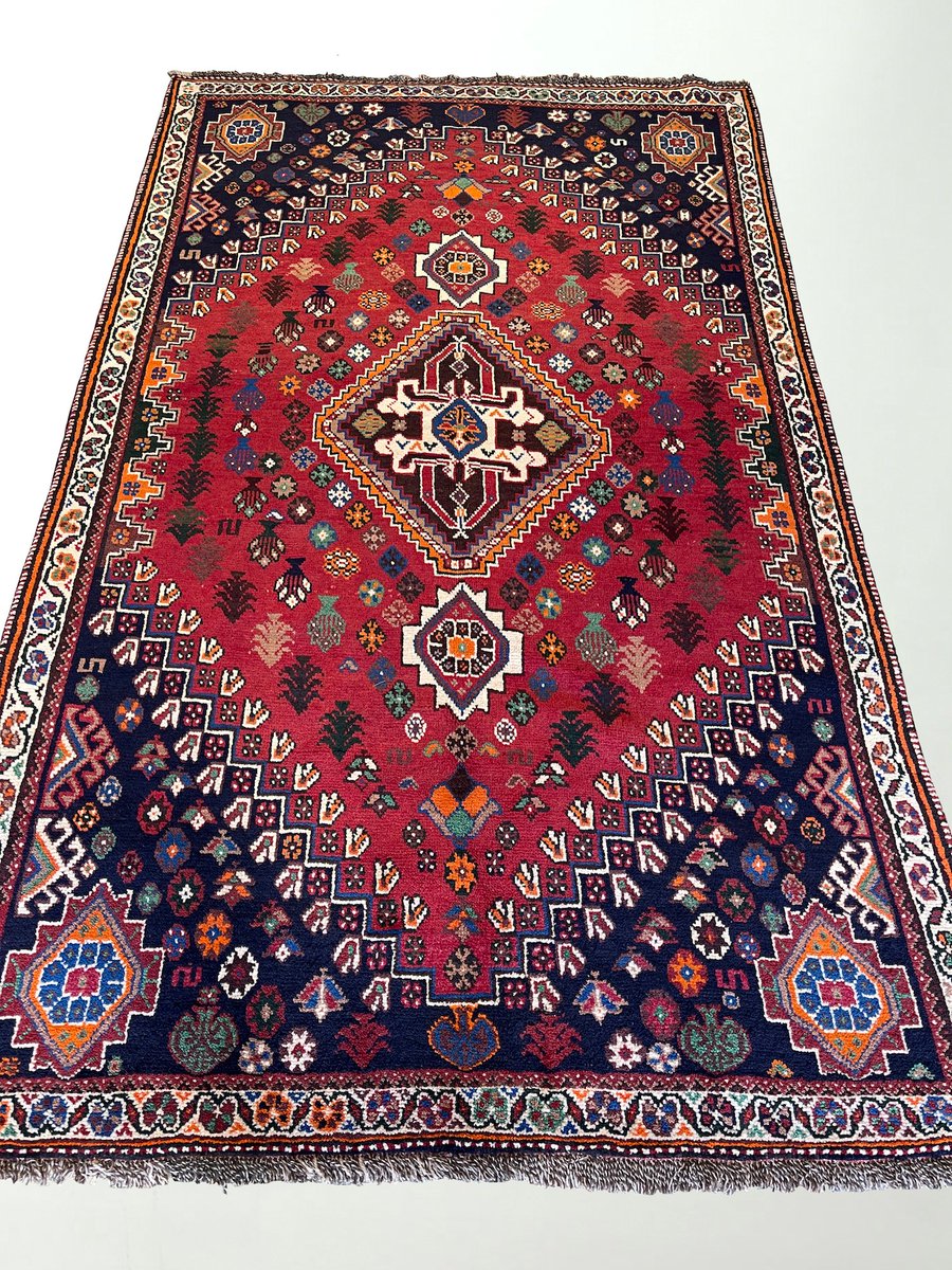 Woven by the nomadic Qashqai tribe of South Central Persia this eye catching rug will bring joy to your home Shop -> bit.ly/3BnWMzR #shopsmall #interiordesign #homedecor #bazaar #Hampshire #Stockbridge