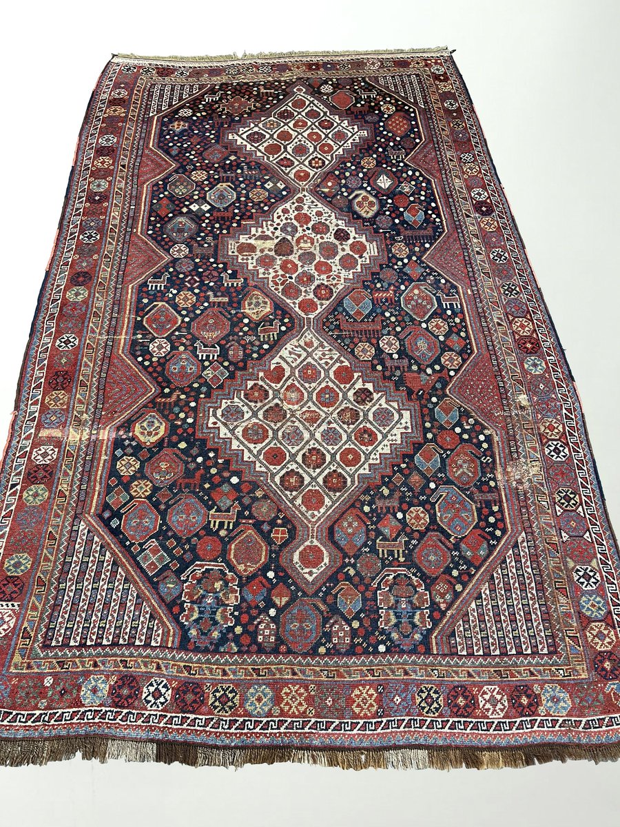 Take home a piece of history with this stunning antique Khamseh rug woven by the Qashqai tribe over 100 years ago Shop -> bit.ly/3rD5LIo #rug #interiordesign #homedecor #shopsmall
