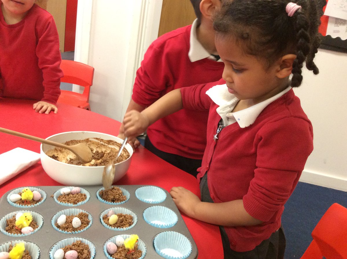 The Nursery children would like to wish you a Happy Easter and Eid Mubarak. Today we made Easter nests in our cooking session. We learned how to turn a solid into a liquid by melting it. Then we mixed it with Shredded Wheat to make a nest.