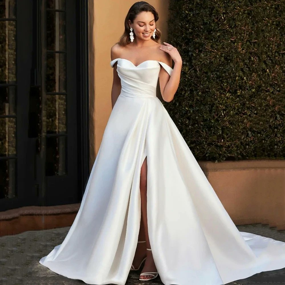 Exude elegance and confidence as you walk down the aisle in our Side Split Satin Wedding Dress. 
.
.
.
#allformetoday #womenfashion #womenclothing  #bridaltrends #bridalgown #newlook #bridaldress #bridalfashion #bridalbouquet #bridalstyle #bridallook #bridalideas #newin #viral