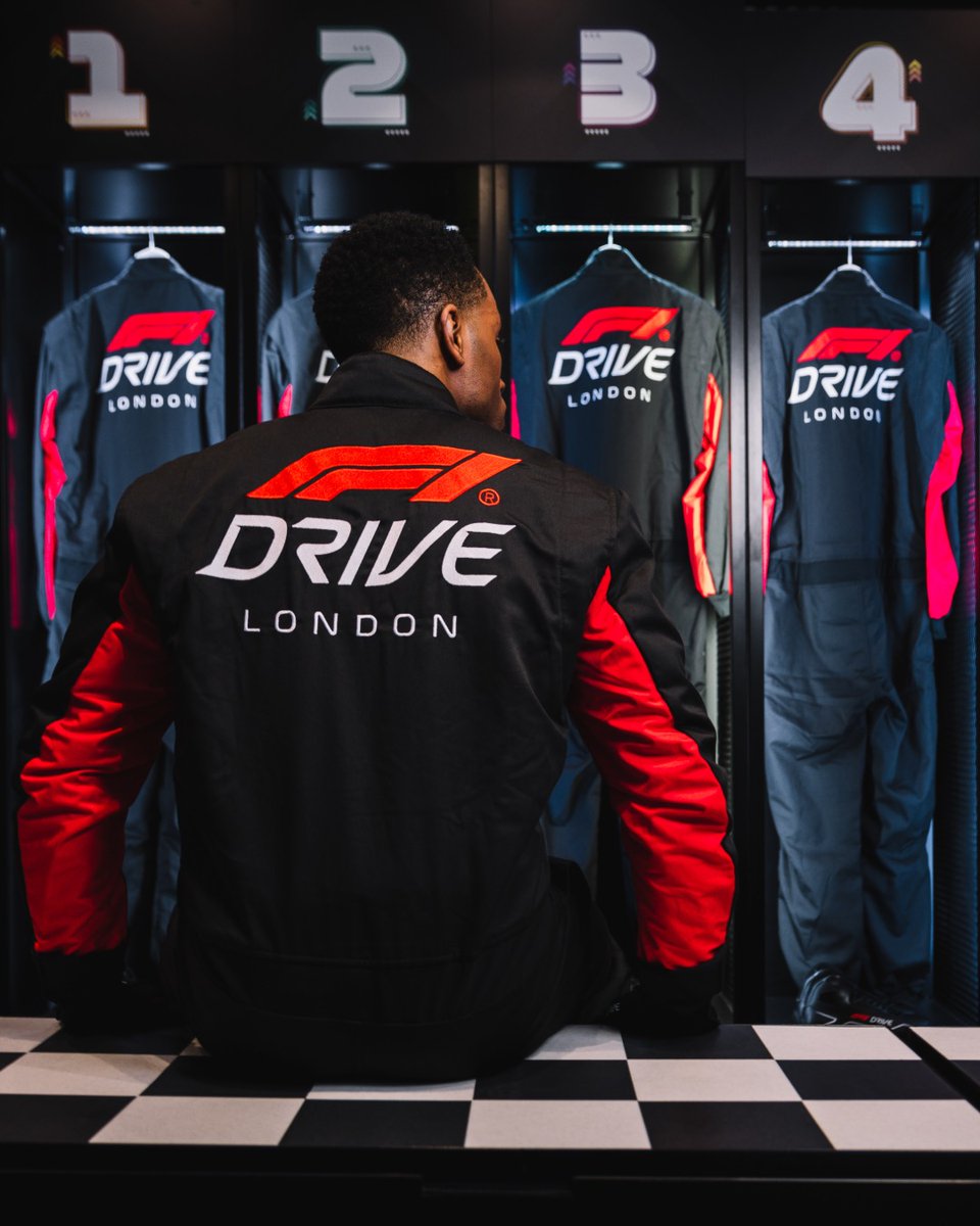 Suited up and ready for the challenge at F1 DRIVE - London! 🔥 Where are you finishing in the battle for the podium?🏆 Excited to hit the track? Get all the details at the link in our bio!🔗 #F1DRIVE