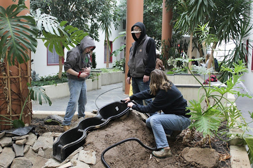 In order to make the waterfall, students placed a tube to the top of the waterfall. This tube allowed the water to travel to the top then makes it way down the waterfall. Once the tube was setup, students covered it with the dirt so it wasn’t visible to viewers.