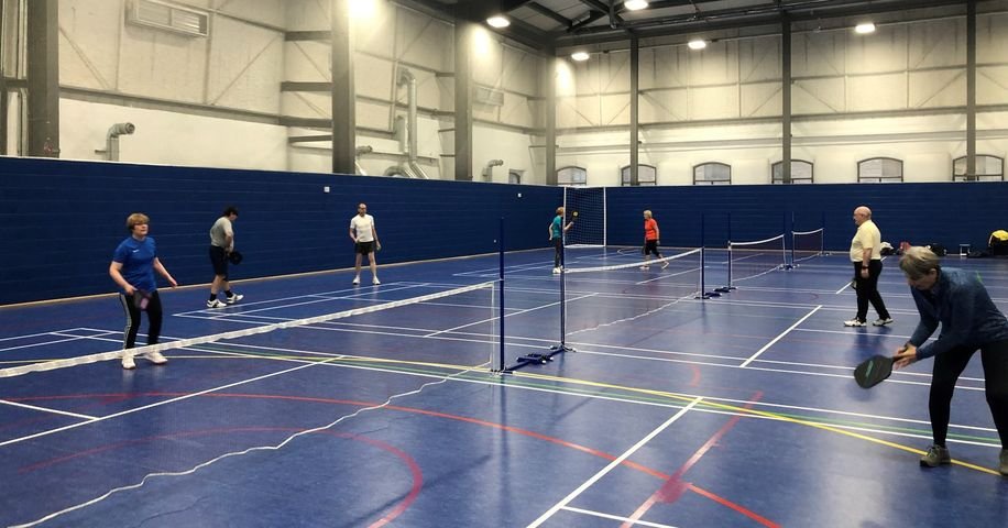 Starting today, you can spice up your leisure time with our brand new Pickleball equipment available for hire! Never tried Pickleball? Now's your chance! It's a fantastic, fun-filled game that combines elements of tennis, badminton, and ping pong. Perfect for all skill levels! 🏓