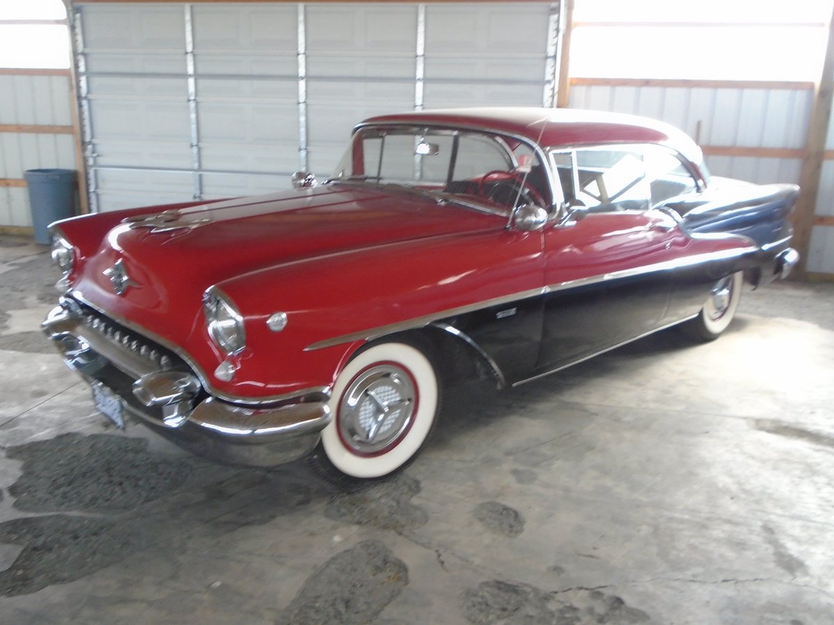 55lincoln / YouTube, 1955 Oldsmobile 88 Holiday hardtop two door coupe. The 1955 models were heavily facelifted with new grillework, taillights and body-side chrome. Horsepower for the 324-cubic-inch Rocket V8 increased to 185 for 88s and 202 for Super 88's.