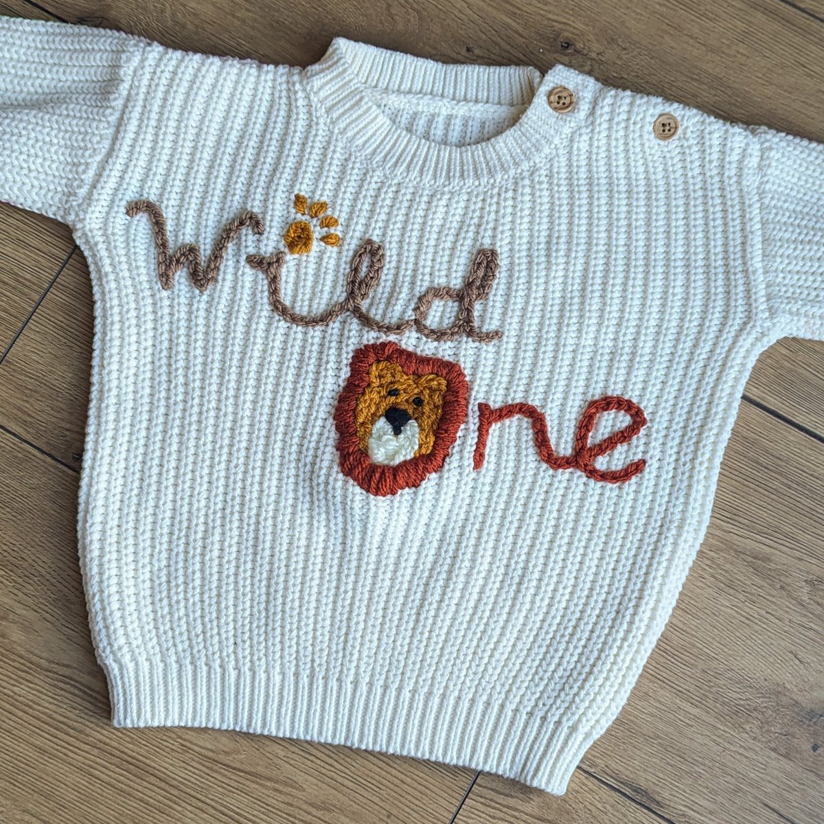 Started embroidering jumpers on mat leave 🪡🧶🌈🦁🌷
