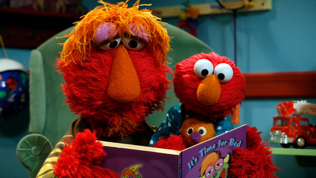 Bedtime stories with daddy make everything better. Elmo loves you, daddy. ❤️📚 #NationalReadingMonth