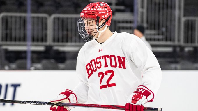 Aiden Celebrini smiling during practice