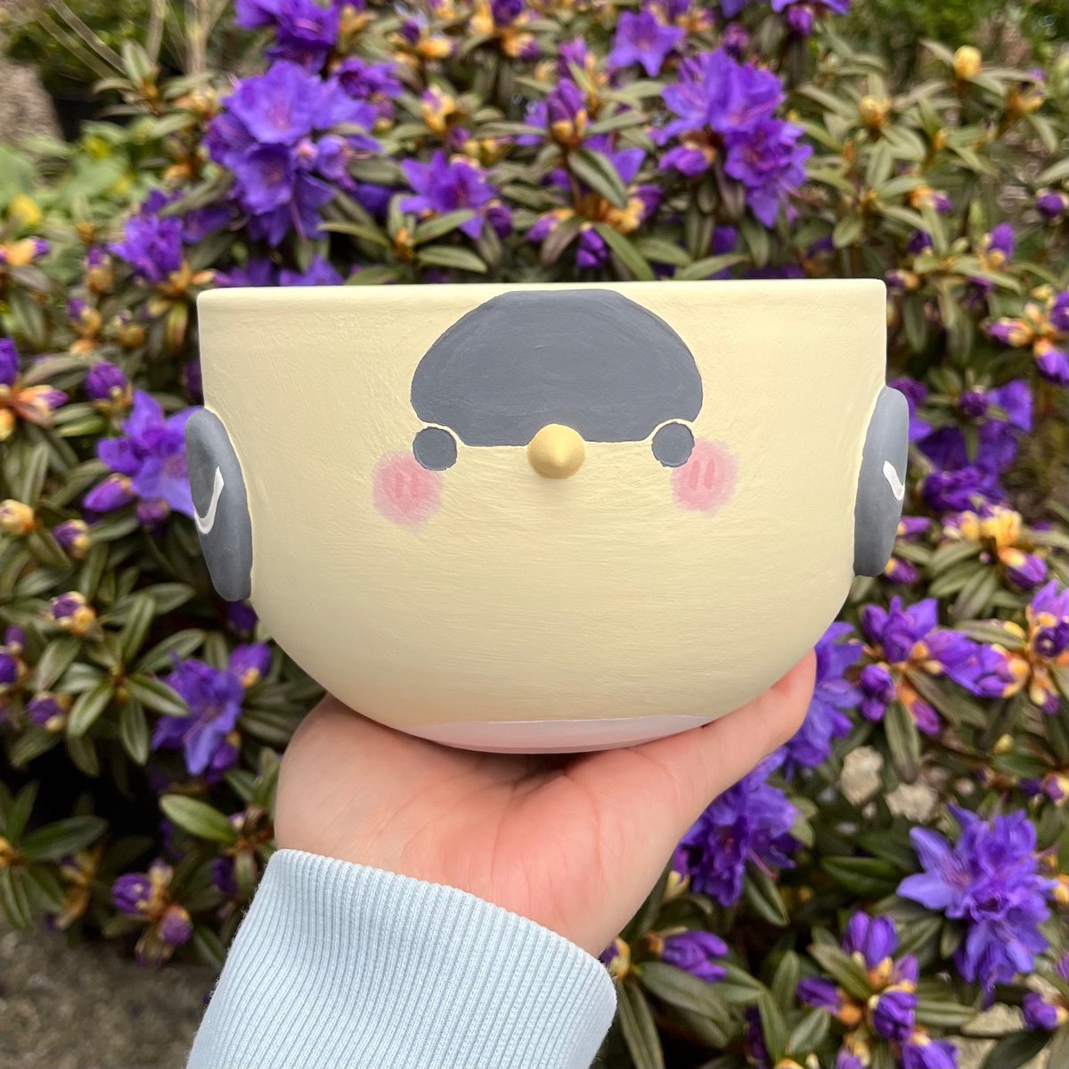 isopaws_studio's tweet photo. Pictures of these borbs by flowers, will be part of our spring collection drop! 🪻🐤💛 soon to be bisque fired!

#pottery #borb https://t.co/LaEgL0DAYW