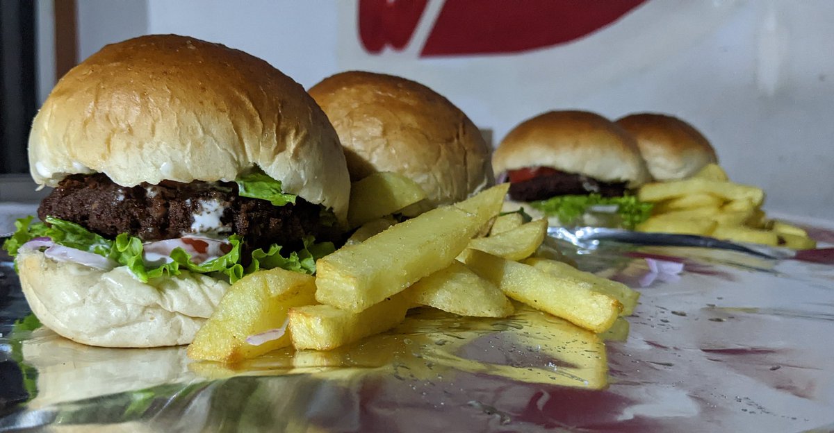 Enjoy a delicious deal every #Wednesday at #DehomeKitchen! Buy one burger and get another absolutely #free. Call us at 0788567422 to place your order for delivery within #Kigali .