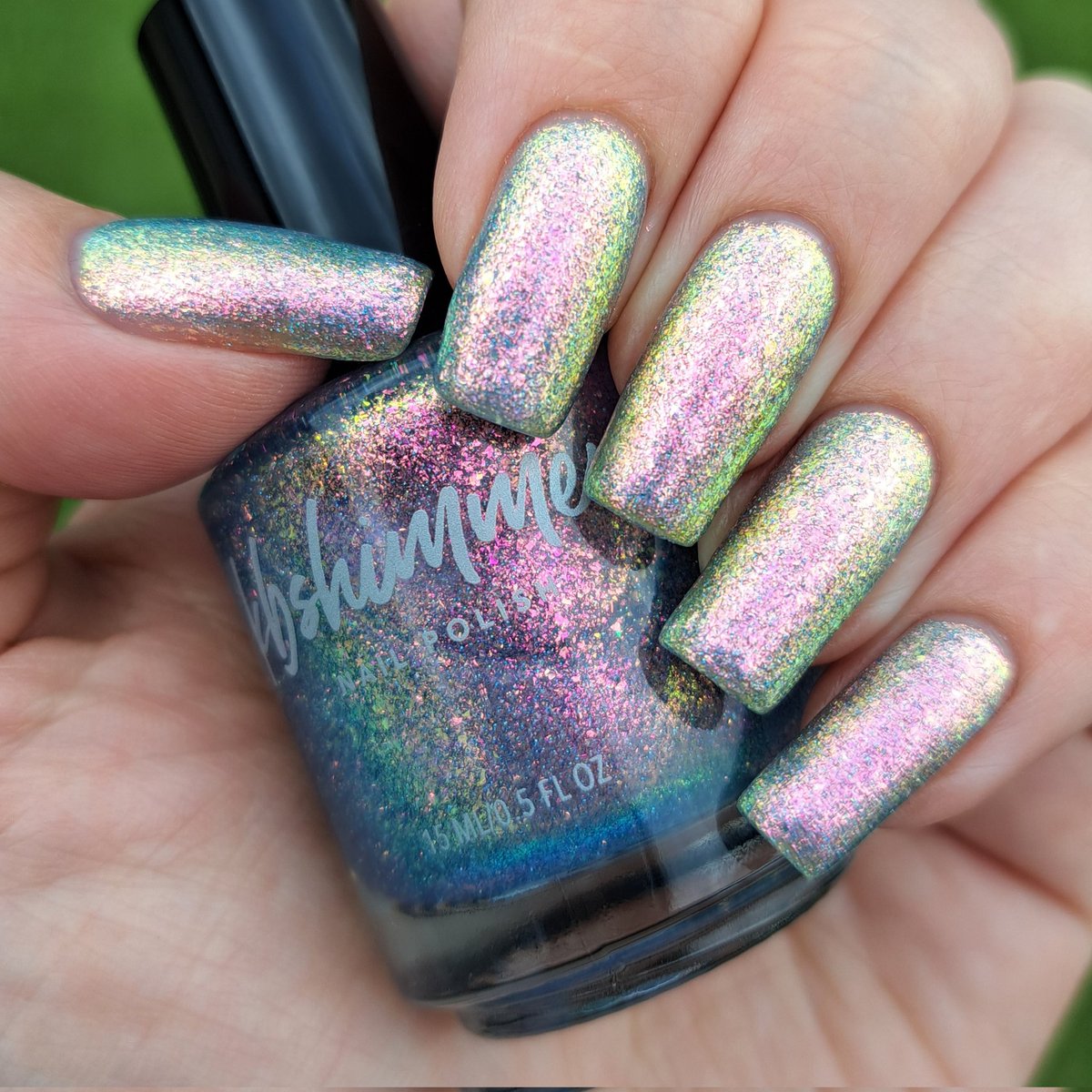 givemesparkles's tweet photo. This week's polish: 'Just The Coolest' from @kbshimmer's Best In Snow collection is a pale periwinkle jelly base packed full of mirco shimmer flakes that shift through pink-peach-gold-lime-blue, plus a dash of holo glitter.  🩵✨️💅 #kbshimmer #indienailpolish #givemesparkles https://t.co/9QjRZbv7i3