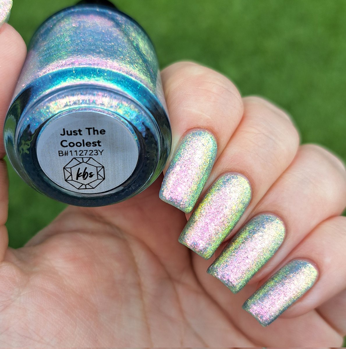 givemesparkles's tweet photo. This week's polish: 'Just The Coolest' from @kbshimmer's Best In Snow collection is a pale periwinkle jelly base packed full of mirco shimmer flakes that shift through pink-peach-gold-lime-blue, plus a dash of holo glitter.  🩵✨️💅 #kbshimmer #indienailpolish #givemesparkles https://t.co/9QjRZbv7i3