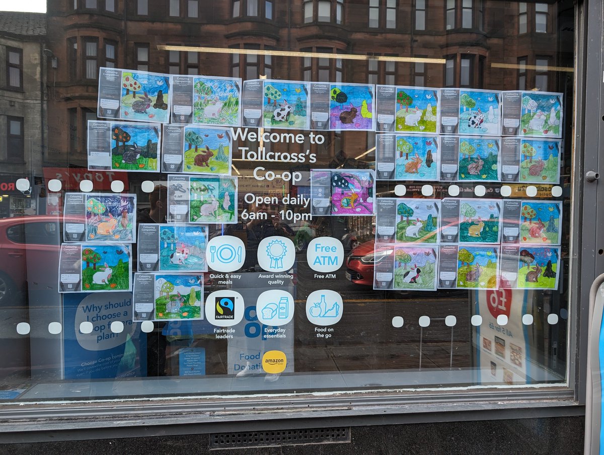 Tollcross Coop Store window is looking lovely with the Easter coloring sheets from @stjoachim1