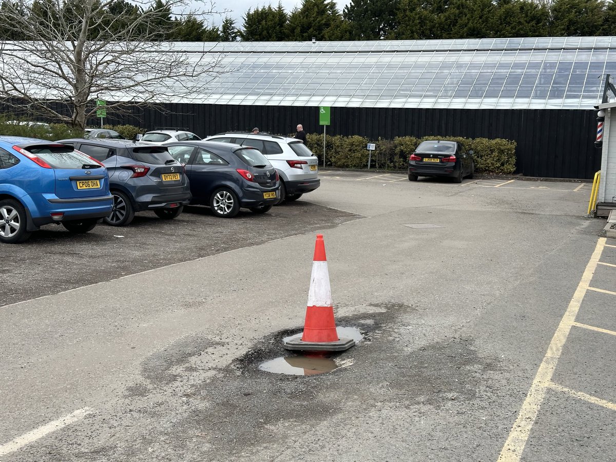 PaulHill88's tweet photo. ⁦⁦@dobbies⁩ in Wallington. The car park has a massive pothole covered by a cone. This has been there for months. The management must be inept or incompetent. Which is it? https://t.co/Bo20j0GhNE