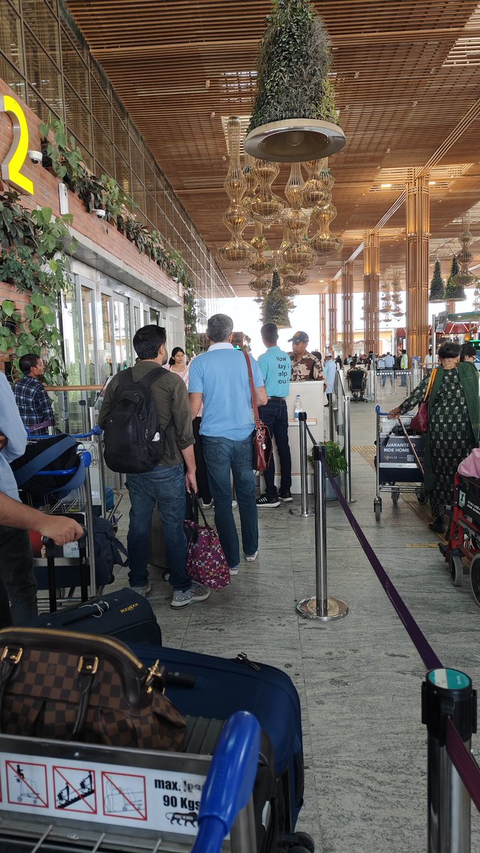 madmanweb's tweet photo. Remember how I mentioned these damn "Digiyatra buddies" that exist just to trick you? There was one such guy when I went through as well but for some reason he went off to talk to someone at the side. In this photo, he was "helping" someone press yes. #ShittyYatra https://t.co/pGaSOkheiJ