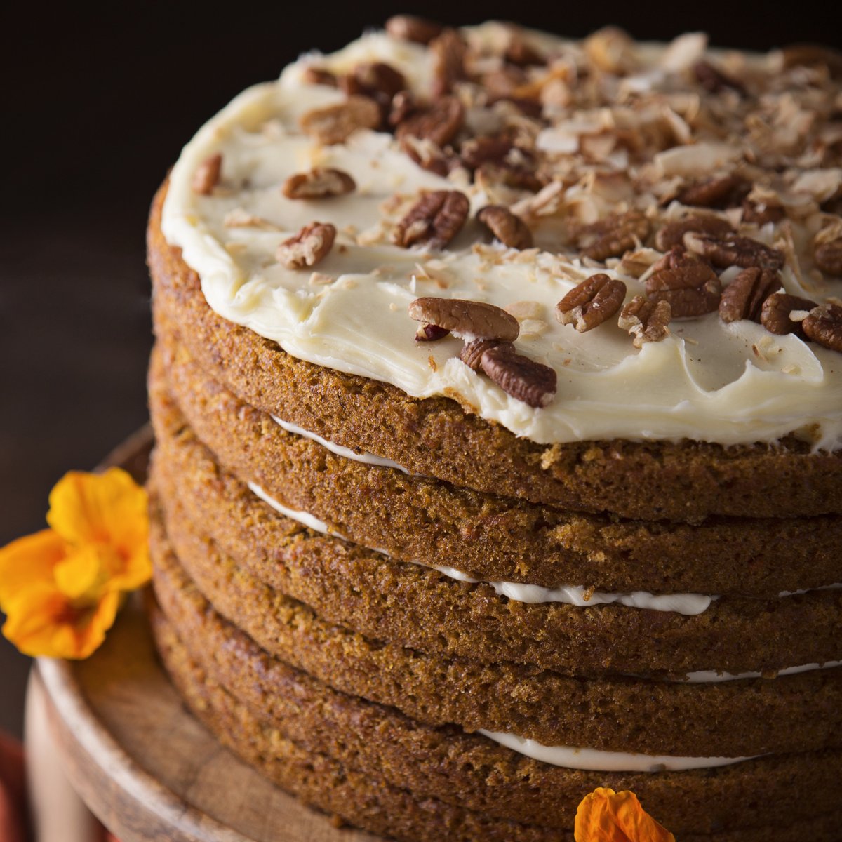 Hop into the weekend with a slice of our delicious Big Iced Carrot Cake, and savor the perfect blend of fresh toasted coconut, crunchy pecans, and smooth cream cheese frosting! 🐰🥕🍰 . . #sweetstreet #sweetstreetdesserts #carrotcake #carrot #cake