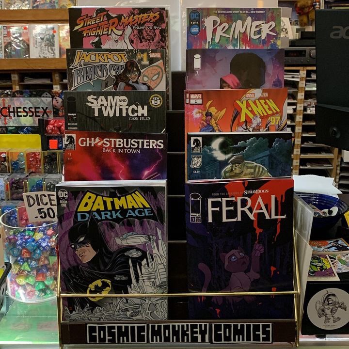 Our featured title rack is filled every week with excellent new titles! #batmandarkage #feral #ghostbustersbackintown #goonthemthatdontstaydead #samandtwitchcasefiles #xmen97 #jackpotandblackcat #underyork #streetfightermastersakumavsryu #primer #ncbd #cosmicmonkeycomics