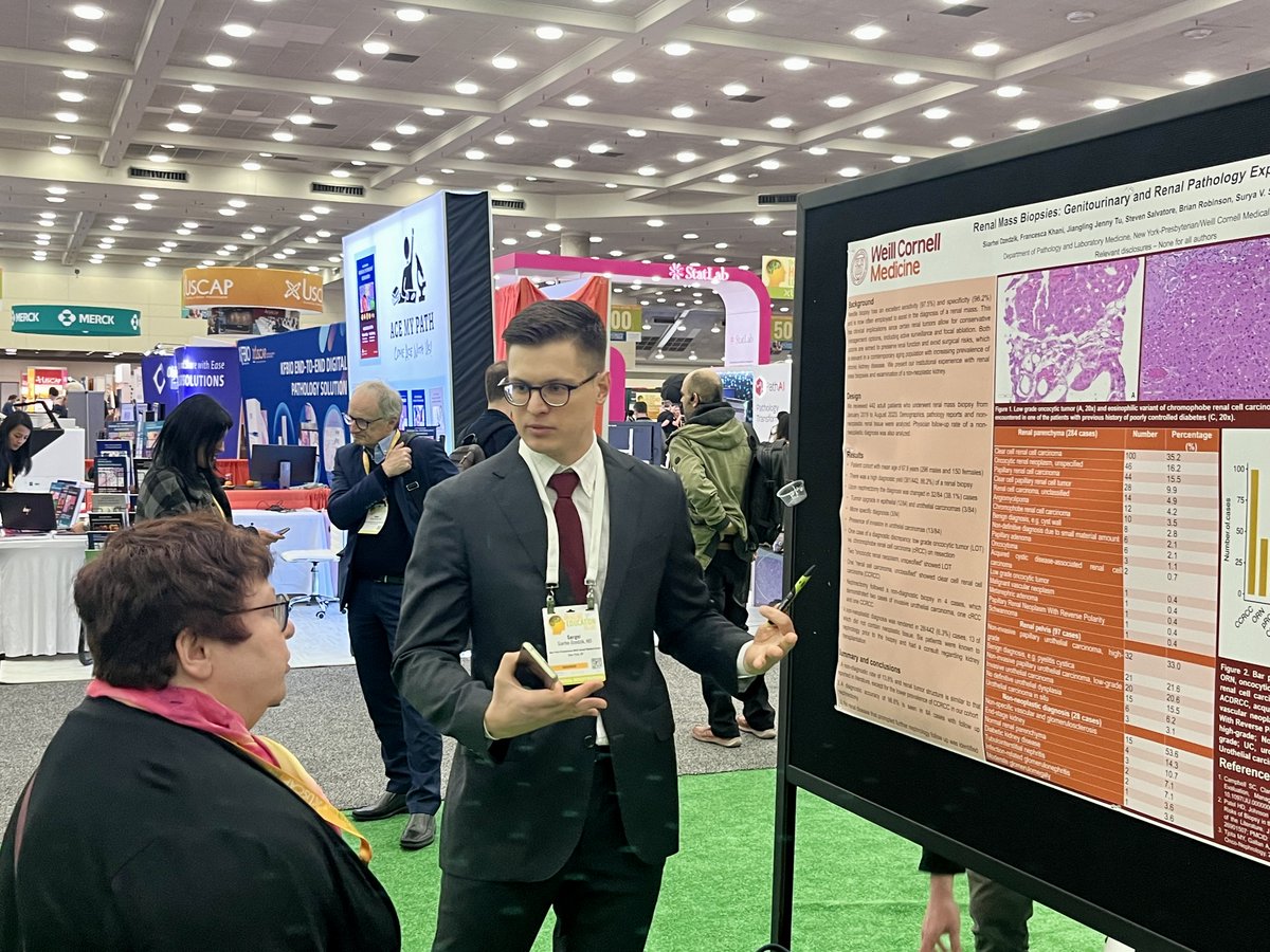 Our @WCMCPathology Resident Dr. Siarhei Dzedzik (@SDzedzik) answering questions about his poster, 'Renal Mass Biopsies: Genitourinary and Renal #Pathology Experience,' this afternoon @TheUSCAP! #USCAP2024 #PathTwitter