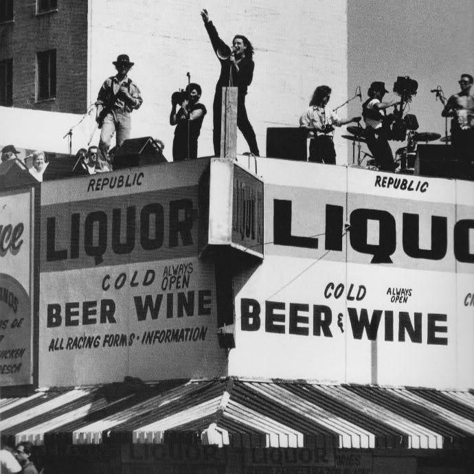 #OnThisDay in 1987, #U2 stopped LA traffic on the corner of Seventh and Main Street as they filmed their #musicvideo for #WhereTheStreetsHaveNoName on a liquor store roof. The event attracted 1000s of spectators. It eventually earned the group a #Grammy Award. #rockangeles