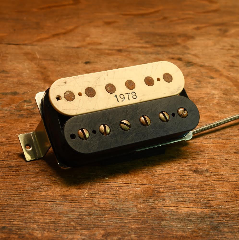 The 1978 Brownbucker in Distressed Zebra.   Power and clarity, the process is as important as the product.  Available with or without the 1978.  I am fond of the 1978.  Engraved and serial numbered since the begenning.
