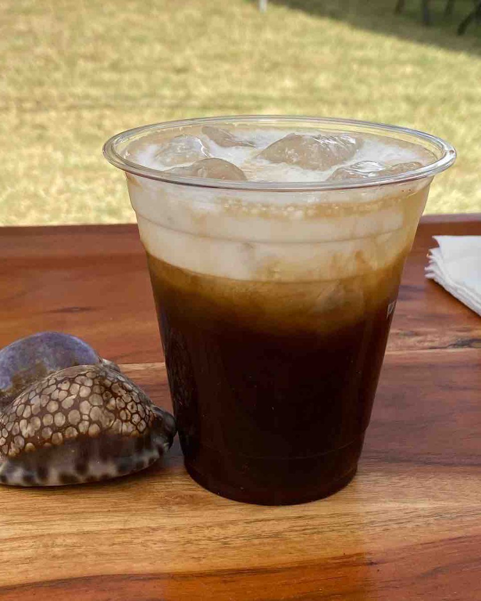 Via @cowriecoffee: Introducing….. THE COWRIE ✨our new signature drink. An iced coffee with laie vanilla and coconut cream🤠🐚🤍✨ YUMMM

It will be available this week at our markets: Thursday Haleiwa & Saturday Pearlridge!