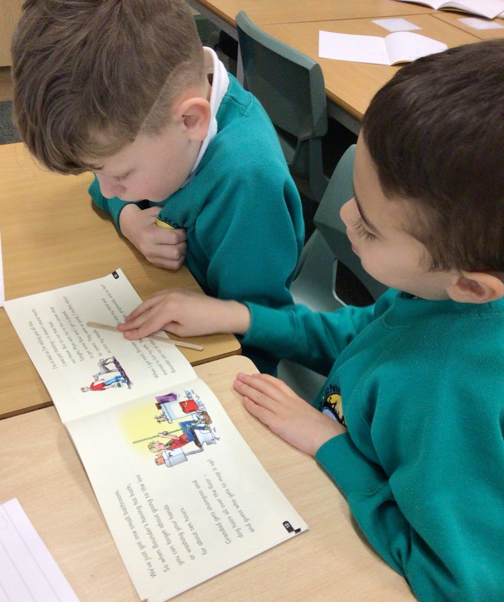 Y1 and Y2 working together to read and practise their story book in phonics. #RWInc #phonics #readingtogether