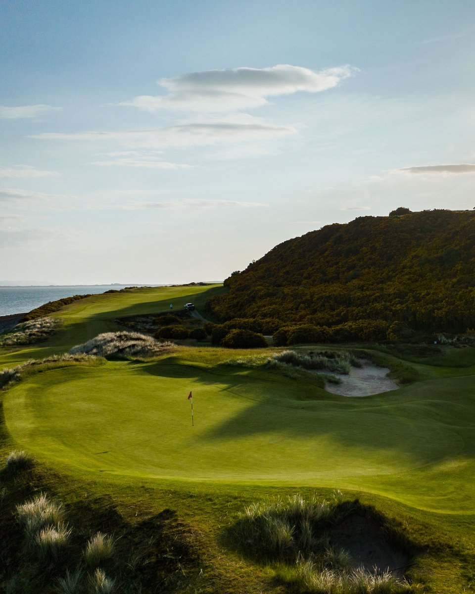 Enjoy breathtaking views from the 11th sea-side green at Castle Stuart Golf Links.