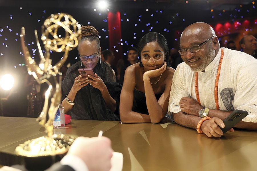 anyways here’s ayo and her parents watching her emmy being engraved part two coming soon