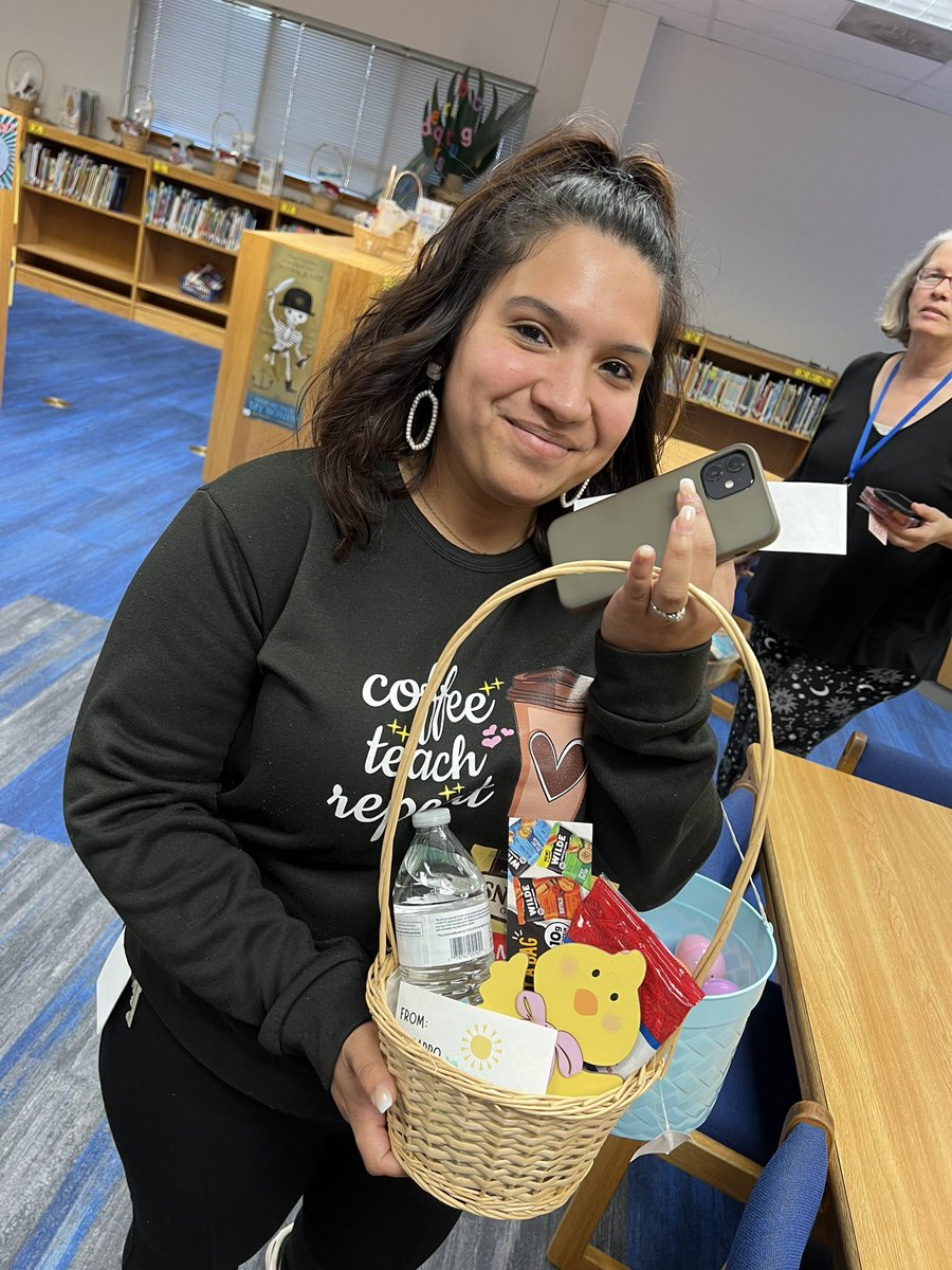 JennnTravis's tweet photo. I’m on my schools Sunshine Committee. 

Today we gifted EVERY staff member an Easter basket with goodies.  My heart was so full watching everyone find their baskets. 

LOOK AT THEIR SMILES!💛💙 https://t.co/KL6JdK13nt