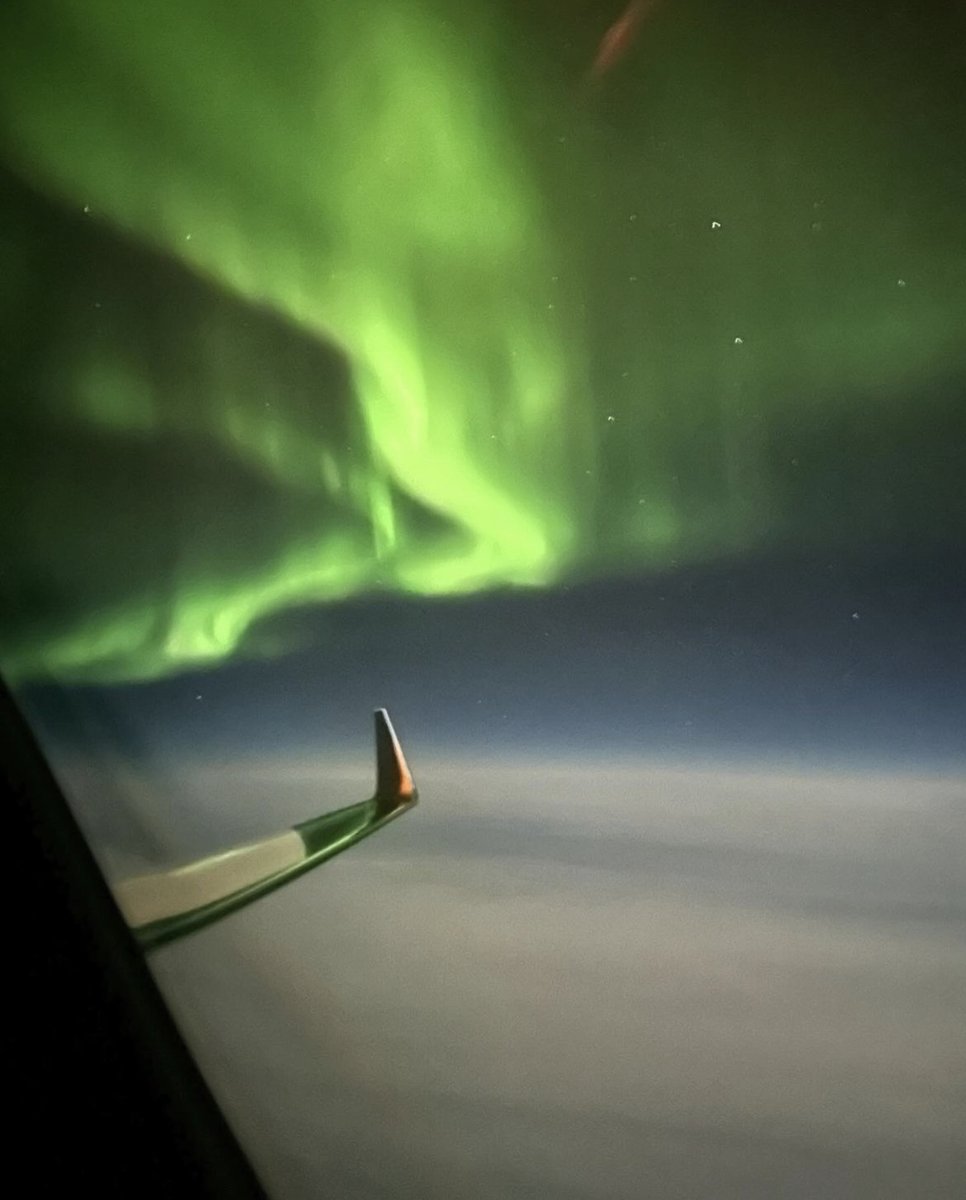 The Aurora Borealis creates a breathtaking and dynamic light show. A mesmerizing view from the oval Flexjet #Gulfstream #G650 windows. 📸: #Flexjet Cabin Server 🛩️ Kristen M.