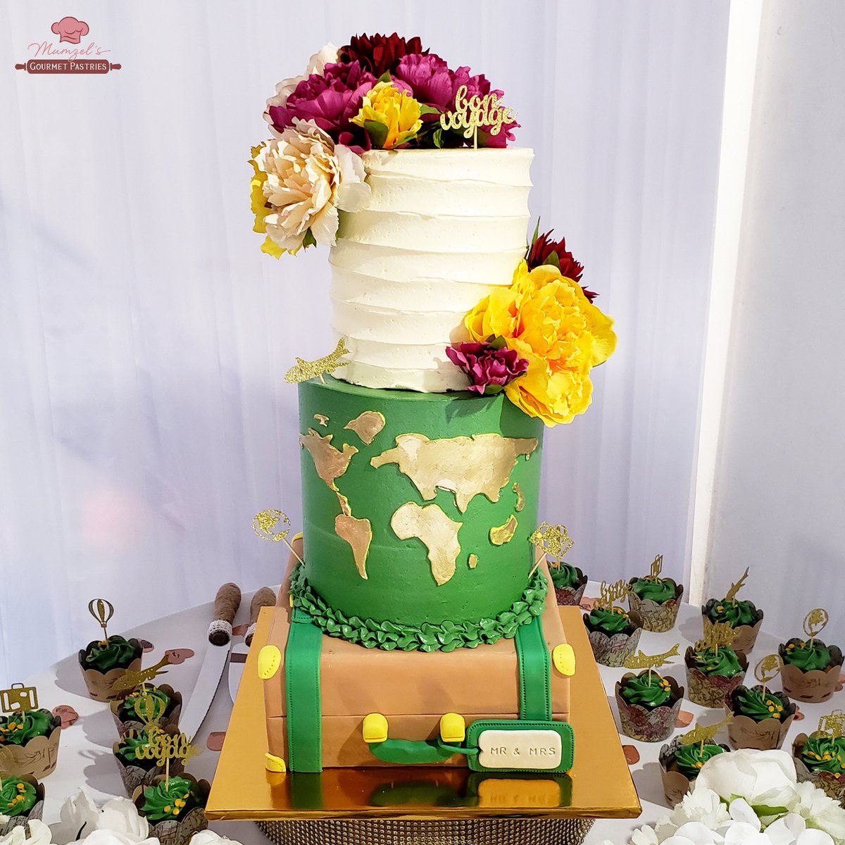 A travel themed wedding with a cute travel themed cake. 🌎🛩️ The couple also wanted their guests to indulge in Baileys and Vanilla cupcakes along with mini Peanut Cakes and mini Gizzadas. 

Request a wedding quote here: form.jotform.com/222141806006847