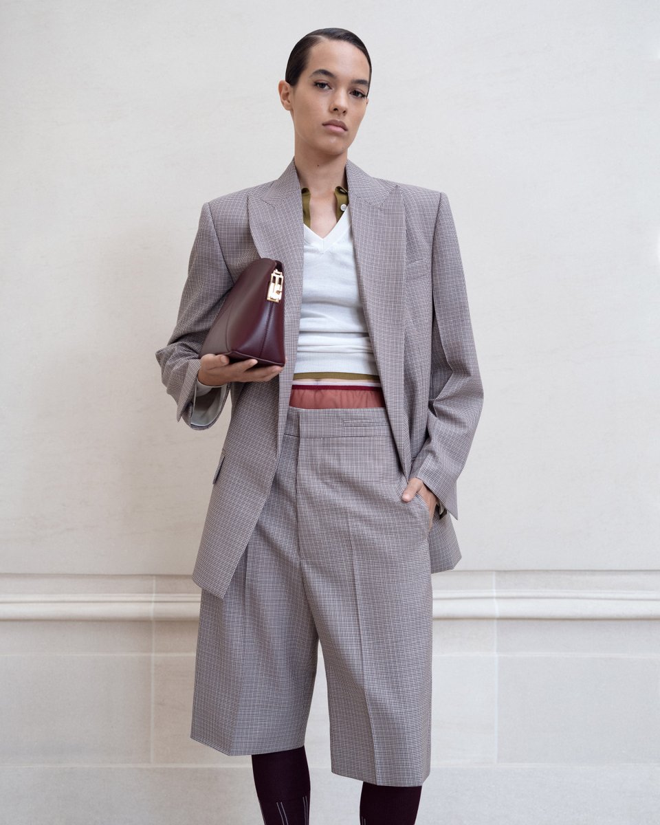 Layering and pops of burgundy bring a fresh take on house tailoring. Discover new season tailoring >> victoriabeckham.visitlink.me/x4TXqb #VBSS24