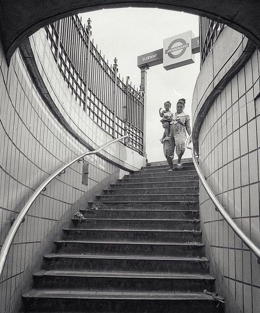 Day 4 Portfolio B&W personal favourite images: Mother and child Piccadilly Circus tube station entrance London 1992 another from the London in the 90s series #picadillycircus #londonunderground #londoninthe90s