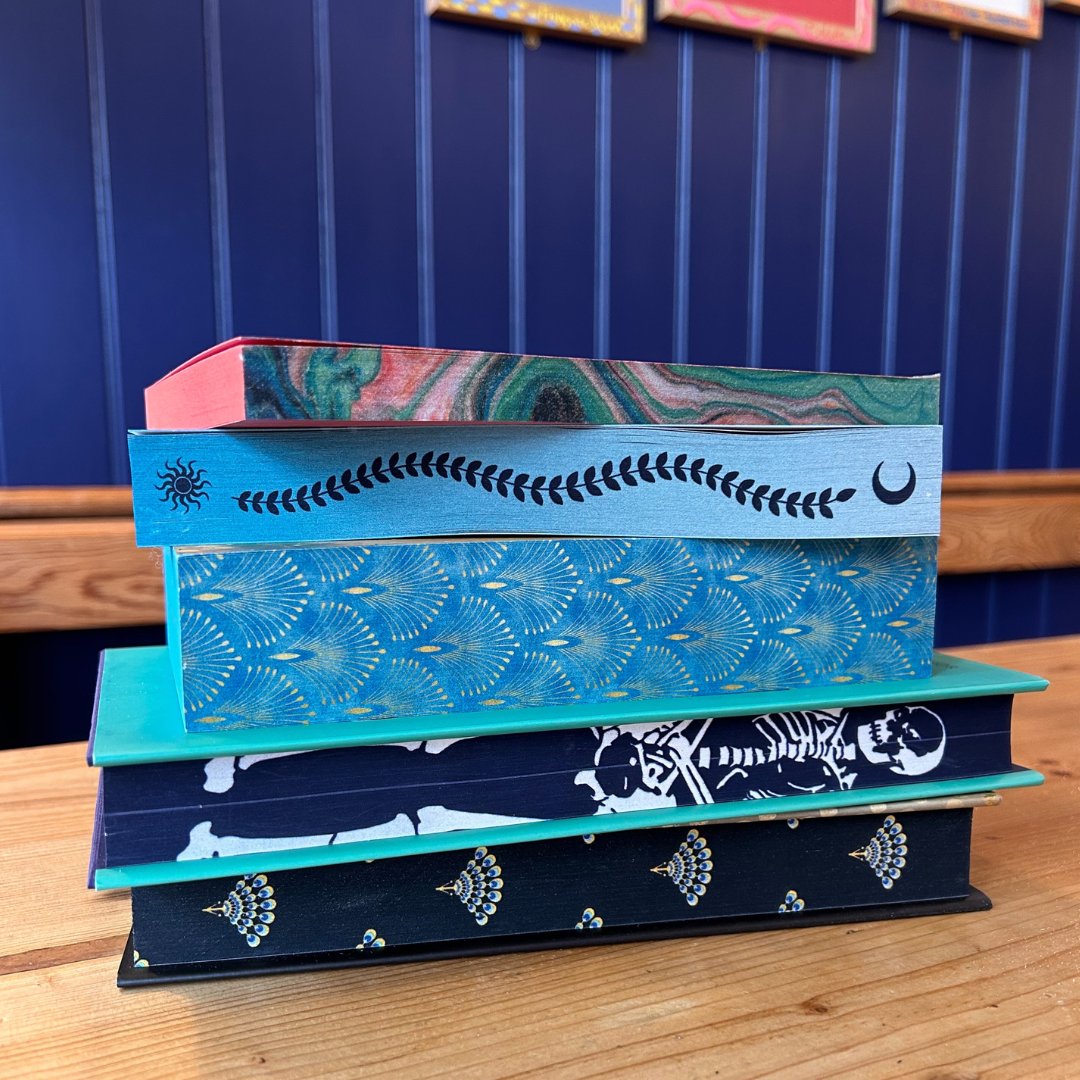 Guess the book 👀 Can you tell which book is which based on their beautiful sprayed edges? #sevenoaks #sevenoaksbusiness #bookshop #indiebookshop #independentbookshop