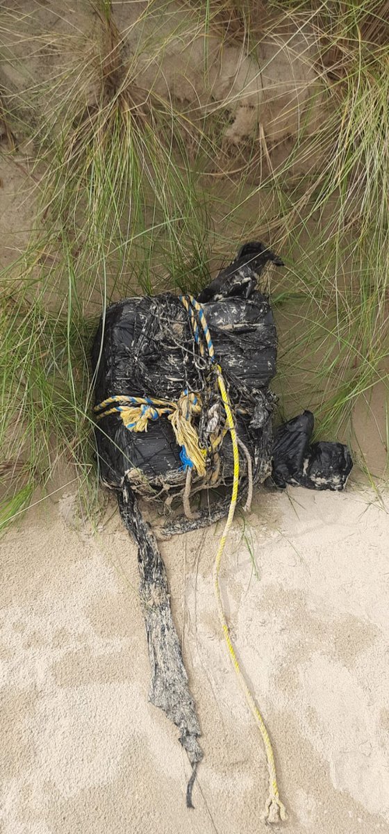 Searches conducted by Donegal ⁦@gardainfo⁩ officers assisted by Louth officers at number locations in Dundalk this morning re the cocaine packages worth in total 4m Euro street value (one shown in this image as found) washed up on north Donegal coast last July. No arrests.