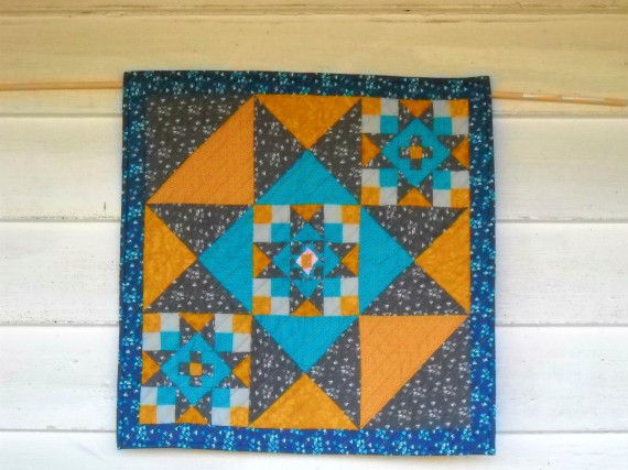 Quilt for sale!  Modern Mini Star Handmade Quilt.  curlicuecreations.etsy.com/listing/160217… #quilts #quiltsforsale #handmade #handmadequilt #modernministarquilt #curlicuecreations #etsyshop #etsy #tabletopper #miniaturequilt #wallhanging #modernquilt